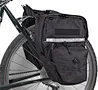 Two large-capacity main compartments. The fabric that connects the two panniers is 5" wide (designed to fit 5" wide racks).
Adjustable compression straps secure one gusseted pocket on each side.